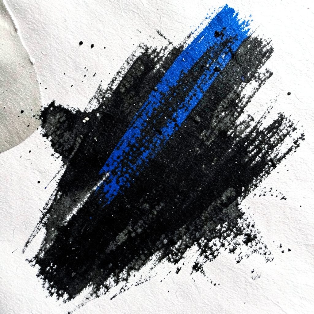 Bold charcoal drawing of a ribbon badge or seal icon, dark near-black background with fine white line work and an electric blue accent, distinguished mood